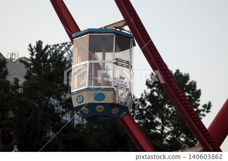 Ferris wheel cabin number 33 blue red park city sky Ferris wheel cabin number 33 blue red park city sky 140603862