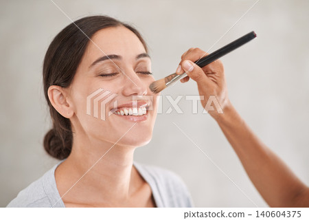 Happy woman, brush and makeup artist hand for beauty, cosmetology and foundation application on white background. Powder, shimmer and cosmetic care at professional salon with model for shine Happy woman, brush and makeup artist hand for beauty, cosmetology and foundation application on white background. Powder, shimmer and cosmetic care at professional salon with model for shine 140604375
