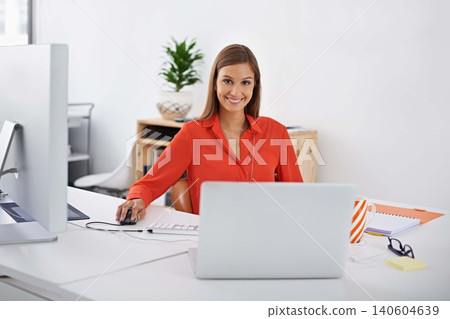 Professional, portrait and happy woman at computer or desktop in office with creative web developer. Website, designer or person with research on internet for development of company software and erp 140604639
