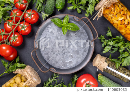 Empty galvanized tray with fresh vegetables and preserved ingredients Empty galvanized tray with fresh vegetables and preserved ingredients 140605083