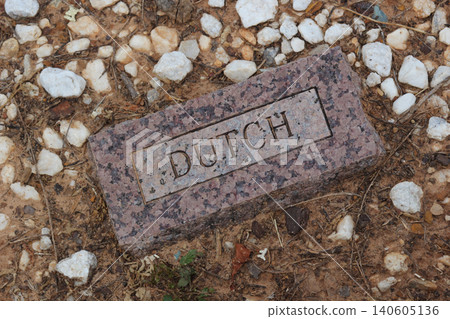 Brick Stone in Cemetery With Word Dutch Engraved 140605136