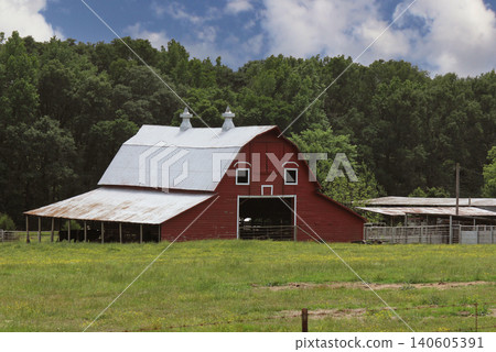 Red Barn located on Farm in East Texas with Blue Sky, Overton TX Red Barn located on Farm in East Texas with Blue Sky, Overton TX 140605391