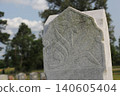 Close up of Historic Headstone With Floral Design in Rural East TX Cemetery 140605404