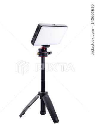 video lamp on a tripod tilted upwards 140605630