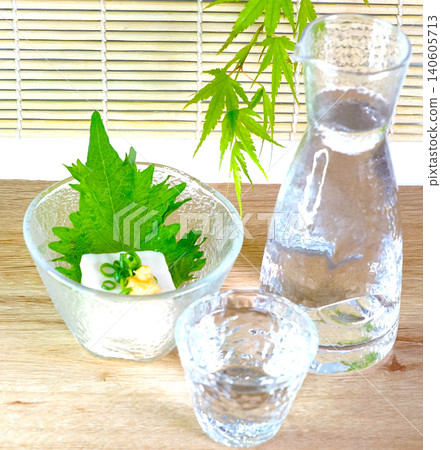 Chilled sake, tofu, and green maple leaves – perfect for enjoying the coolness of summer. 140605713