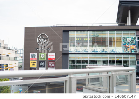 [Odawara Station] Exterior view of commercial facilities and buildings in front of the east exit of the station. 140607147