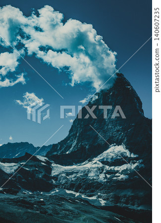 Alps Matterhorn mountain summer landscape at dramatic light Alps Matterhorn mountain summer landscape at dramatic light 140607235