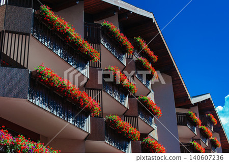 Alps traditional house with flowers at summer Alps traditional house with flowers at summer 140607236