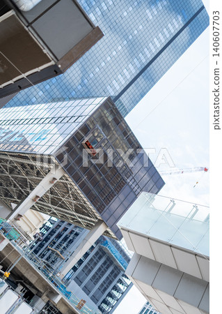 [Hamamatsucho] A view looking up at the cluster of skyscrapers that are being demolished and rebuilt as part of urban redevelopment. 140607703
