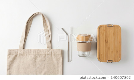 Sustainable lunch and travel accessory set with cotton bag and bamboo container plastic free sustainable reusable lifestyle environment accessories conscious minimalist biodegradable 140607802