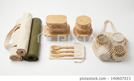 Sustainable eco friendly household and kitchen accessories collection with utensils containers reusable friendly sustainable lifestyle environment conscious minimalist background isolated Sustainable eco friendly household and kitchen accessories collection with utensils containers reusable friendly sustainable lifestyle environment conscious minimalist background isolated 140607815