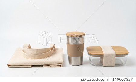 Zero waste eco friendly kitchen essentials and food storage set with plastic free sustainable reusable container lifestyle environment conscious essentials friendly material background Zero waste eco friendly kitchen essentials and food storage set with plastic free sustainable reusable container lifestyle environment conscious essentials friendly material background 140607837