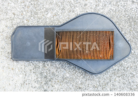 Dirty condition of a scooter's air cleaner filter (1) 140608336