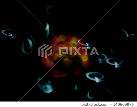 Beautiful in-camera multiple exposure: flowers floating in the darkness and lights forming circles. 140609976