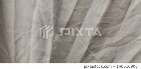 Elegant cream fabric texture with soft folds and natural textile background. Elegant cream fabric texture with soft folds and natural textile background. 140610906