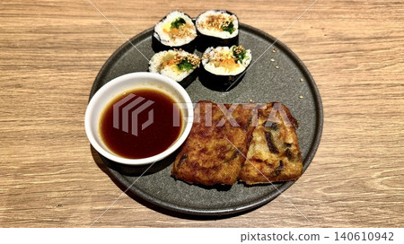 Kimbap and jeon, Korean dishes served on a plate Kimbap and jeon, Korean dishes served on a plate 140610942