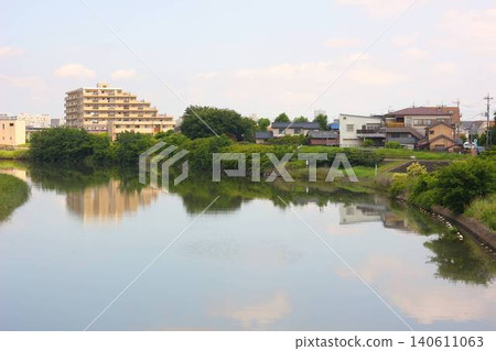 The tranquil river scenery of the Ayase River and the surrounding townscape as seen from Gamou Ohashi Bridge The tranquil river scenery of the Ayase River and the surrounding townscape as seen from Gamou Ohashi Bridge 140611063