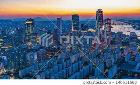 High-angle panoramic view of Yeouido financial district skyscrapers at sunset in Seoul, South Korea High-angle panoramic view of Yeouido financial district skyscrapers at sunset in Seoul, South Korea 140611660