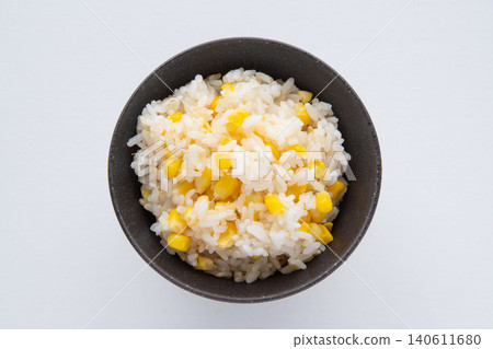 Corn rice served in a bowl Corn rice served in a bowl 140611680