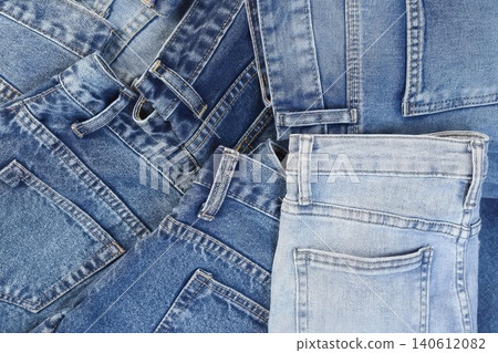 Assorted denim jeans in different colors and styles Assorted denim jeans in different colors and styles 140612082