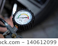 Air compressor pressure gauge on industrial equipment 140612099