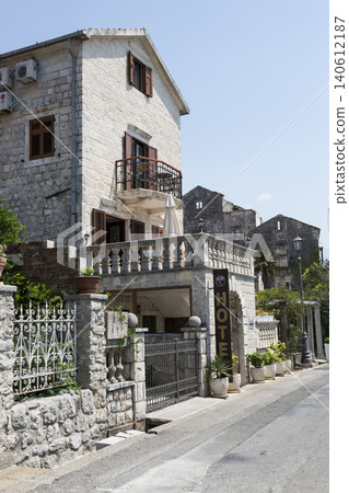 Perast, Montenegro - August 4, 2017: Building and construction on the embankment near the sea 140612187