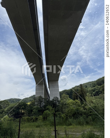 Elevated bridges supporting social infrastructure and lush green landscapes Elevated bridges supporting social infrastructure and lush green landscapes 140612652