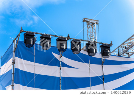 Outdoor concert stage lighting rig with metal truss 140612929