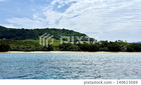 Coastline viewed from the sea near Nishizaki on Ishigaki Island in the Yaeyama Islands, Okinawa Prefecture. Coastline viewed from the sea near Nishizaki on Ishigaki Island in the Yaeyama Islands, Okinawa Prefecture. 140613089
