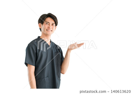Young Asian male doctor, nurse, caregiver, and emergency physician wearing scrubs Young Asian male doctor, nurse, caregiver, and emergency physician wearing scrubs 140613620