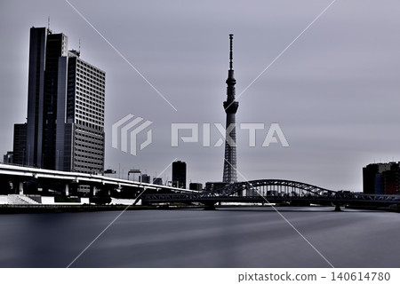 A long-exposure shot of Tokyo Skytree and the newly renovated Shirahige Bridge as seen from the Sumida River Terrace. A long-exposure shot of Tokyo Skytree and the newly renovated Shirahige Bridge as seen from the Sumida River Terrace. 140614780