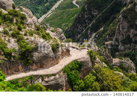 Cable car station and cliffside mountain path in Montserrat Natural Park Spain Cable car station and cliffside mountain path in Montserrat Natural Park Spain 140614817