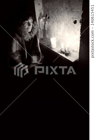 Old woman hiding in bombshelter cellar 140615451