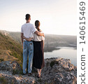 Girl and guy on the hill 140615469