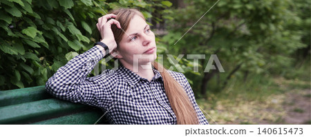 Young pretty girl on the bench Young pretty girl on the bench 140615473