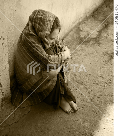Frozen girl sitting on the floor Frozen girl sitting on the floor 140615476