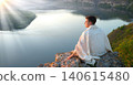 Young man sit on the hill 140615480