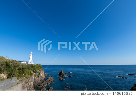 Mie Prefecture, Shima City, Daiozaki Lighthouse (Daiozaki Lighthouse): Image of the lighthouse against a blue sky. Mie Prefecture, Shima City, Daiozaki Lighthouse (Daiozaki Lighthouse): Image of the lighthouse against a blue sky. 140615855