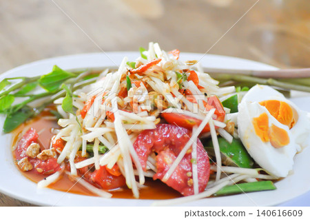 spicy salad, som tam or Thai spicy salad or papaya salad or vegetable salad spicy salad, som tam or Thai spicy salad or papaya salad or vegetable salad 140616609