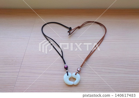 A necklace I made myself during a magatama (comma-shaped bead) making experience at Tamatsukuri Onsen. A necklace I made myself during a magatama (comma-shaped bead) making experience at Tamatsukuri Onsen. 140617483