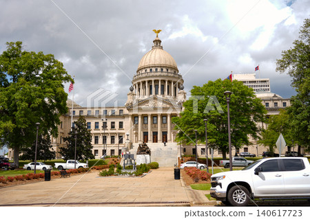 Mississippi State Capitol Exterior with Parked Vehicles and Stormy Sky Jackson Mississippi State Capitol Exterior with Parked Vehicles and Stormy Sky Jackson 140617723