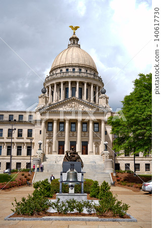 Symmetrical Front View Mississippi State Capitol with Statue and Overcast Sky Symmetrical Front View Mississippi State Capitol with Statue and Overcast Sky 140617730