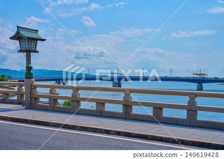 A view from Matsue Ohashi Bridge in Matsue City, Shimane Prefecture, in spring, looking west towards Shinji Lake Ohashi Bridge (Shinji Lake, Ohashi River, etc.). A view from Matsue Ohashi Bridge in Matsue City, Shimane Prefecture, in spring, looking west towards Shinji Lake Ohashi Bridge (Shinji Lake, Ohashi River, etc.). 140619428
