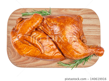 Whole smoked chicken on wooden cutting board isolated top view rustic roasted poultry composition Whole smoked chicken on wooden cutting board isolated top view rustic roasted poultry composition 140619916