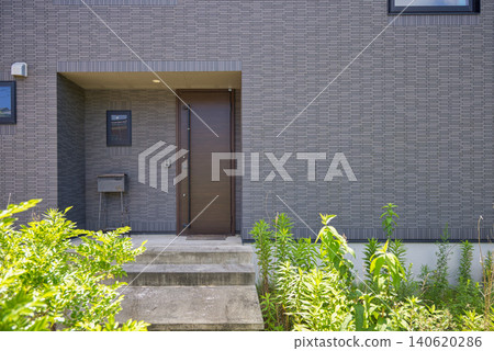 Entrance approach with weeds Entrance approach with weeds 140620286