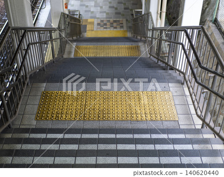 Stairs leading down to the station platform Stairs leading down to the station platform 140620440