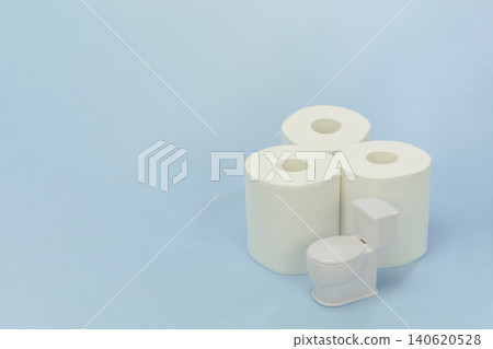 Miniature white toilet and white toilet paper Miniature white toilet and white toilet paper 140620528