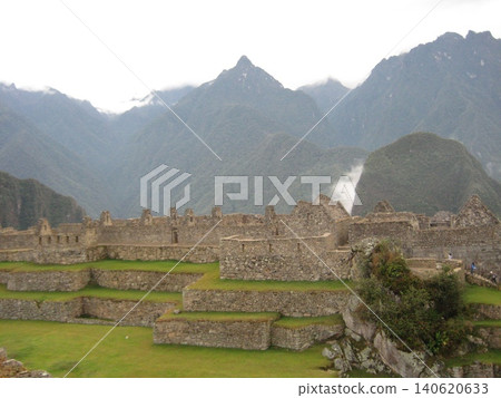 The scenery of the Machu Picchu ruins shrouded in morning mist. The scenery of the Machu Picchu ruins shrouded in morning mist. 140620633