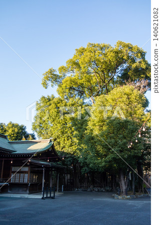 The historical buildings of Rokugo Shrine in Ota Ward, Tokyo, under the bright sunlight. The historical buildings of Rokugo Shrine in Ota Ward, Tokyo, under the bright sunlight. 140621082