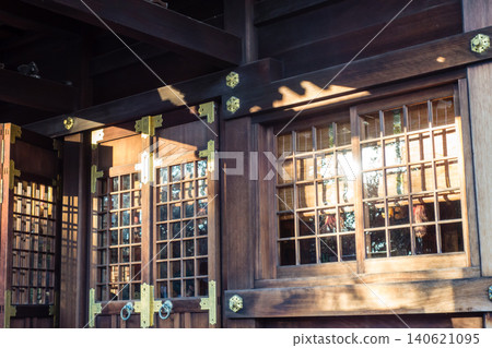 The historical buildings of Rokugo Shrine in Ota Ward, Tokyo, under the bright sunlight. The historical buildings of Rokugo Shrine in Ota Ward, Tokyo, under the bright sunlight. 140621095